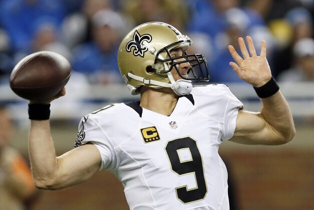 New Orleans Saints quarterback Drew Brees throws during the first half of an NFL football game against the Detroit Lions in Detroit, Sunday, Oct. 19, 2014. (AP Photo/Paul Sancya)