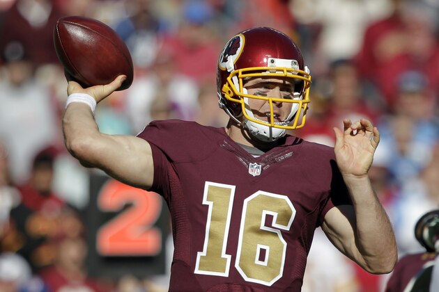 Washington Redskins quarterback Colt McCoy (16) passes the ball during the second half of an NFL football game against the Tennessee Titans, Sunday, Oct. 19, 2014, in Landover, Md. (AP Photo/Mark E. Tenally)