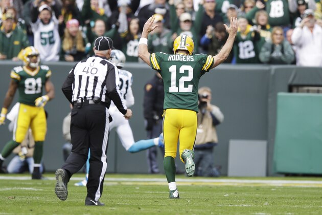 Green Bay Packers quarterback Aaron Rodgers celebrates a touchdown pass to Davante Adams (17) during the second half of an NFL football game against the Carolina Panthers Sunday, Oct. 19, 2014, in Green Bay, Wis. (AP Photo/Tom Lynn) Green Bay Packers quarterback Aaron Rodgers celebrates a touchdown pass to Davante Adams (17) during the second half of an NFL football game against the Carolina Panthers Sunday, Oct. 19, 2014, in Green Bay, Wis. (AP Photo/Tom Lynn)