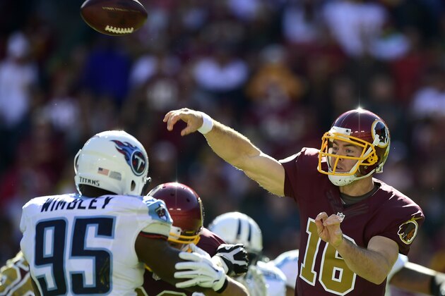 LANDOVER, MD - OCTOBER 19:  Colt McCoy #16 of the Washington Redskins passes against the Tennessee Titans during third quarter at FedEx Field on October 19, 2014 in Landover, Maryland.  (Photo by Patrick McDermott/Getty Images)