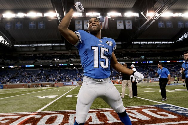 Detroit Lions wide receiver Golden Tate celebrates their 24-23 victory over the New Orleans Saints after a NFL football game in Detroit, Sunday, Oct. 19, 2014. (AP Photo/Paul Sancya)