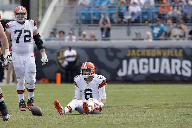 Cleveland Browns quarterback Brian Hoyer (6) sits on the after being sacked by the Jacksonville Jaguars defense during the second half of an NFL football game, Sunday, Oct. 19, 2014, in Jacksonville, Fla. The Jaguars beat the Browns 24-6. (AP Photo/Stephen B. Morton)