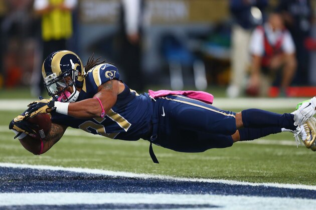 ST. LOUIS, MO - OCTOBER 19: Tre Mason #27 of the St. Louis Rams rushes for a touchdown in the first quarter against the St. Louis Rams at the Edward Jones Dome on October 19, 2014 in St. Louis, Missouri.  (Photo by Dilip Vishwanat/Getty Images)