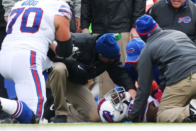 ORCHARD PARK, NY - OCTOBER 19:  C.J. Spiller #28 of the Buffalo Bills is tended to after being injured against the Minnesota Vikings during the first half at Ralph Wilson Stadium on October 19, 2014 in Orchard Park, New York.  (Photo by Tom Szczerbowski/Getty Images)