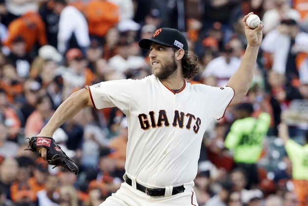 San Francisco Giants starting pitcher Madison Bumgarner throws during the first inning of Game 5 of the National League baseball championship series against the St. Louis Cardinals Thursday, Oct. 16, 2014, in San Francisco. (AP Photo/David J. Phillip)