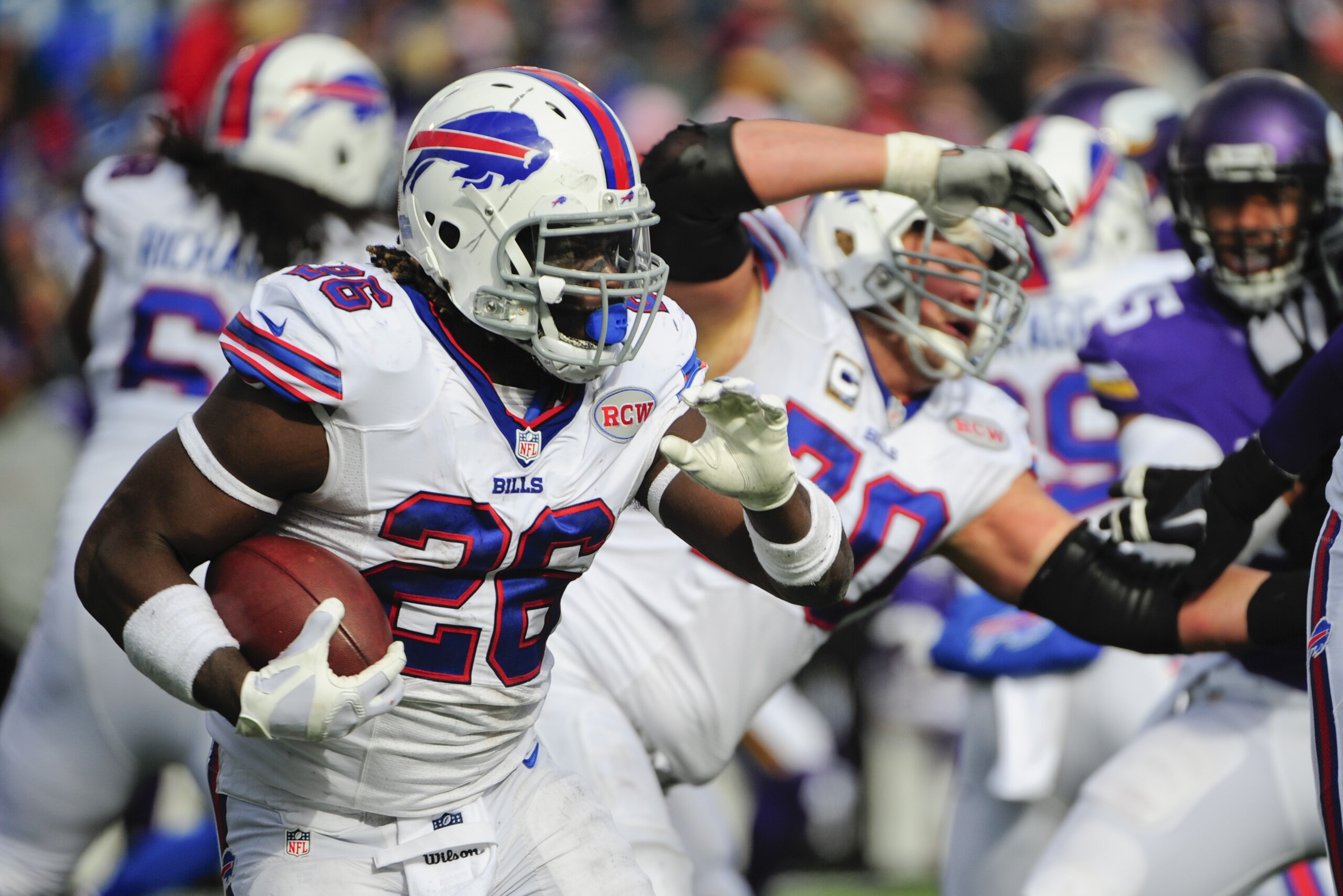 Buffalo Bills running back Anthony Dixon (26) rushes during the second half of an NFL football game against the Minnesota Vikings Sunday, Oct. 19, 2014, in Orchard Park, N.Y.  (AP Photo/Gary Wiepert)