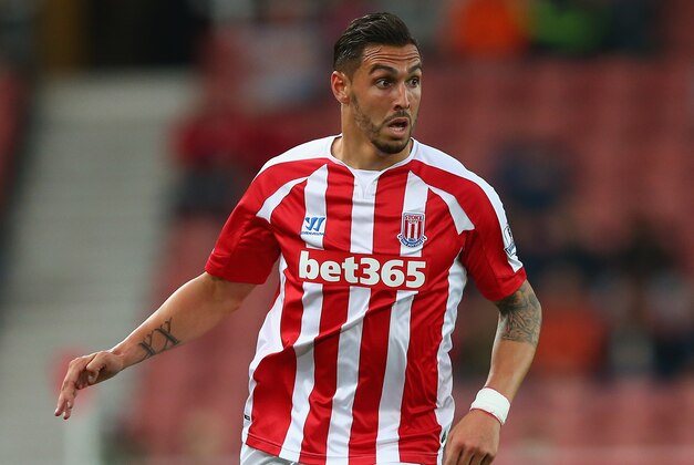 STOKE ON TRENT, ENGLAND - AUGUST 27:  Geoff Cameron of Stoke City in action during the Capital One Cup Second Round match between Stoke City and Portsmouth at Britannia Stadium on August 27, 2014 in Stoke on Trent, England.  (Photo by Clive Brunskill/Getty Images)