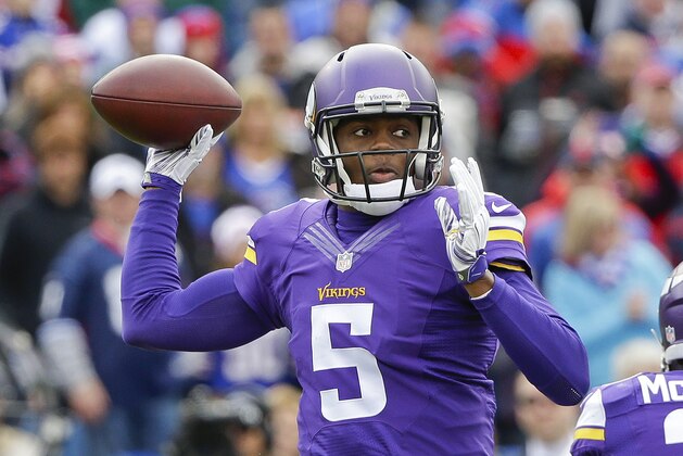 Minnesota Vikings quarterback Teddy Bridgewater (5) throws a pass during the first half of an NFL football game against the Buffalo Bills Sunday, Oct. 19, 2014, in Orchard Park, N.Y.  (AP Photo/Bill Wippert)