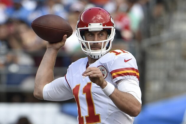 Kansas City Chiefs quarterback Alex Smith looks to throw a pass against the San Diego Chargers during the second half of an NFL football game, Sunday, Oct. 19, 2014, in San Diego. (AP Photo/Denis Poroy)