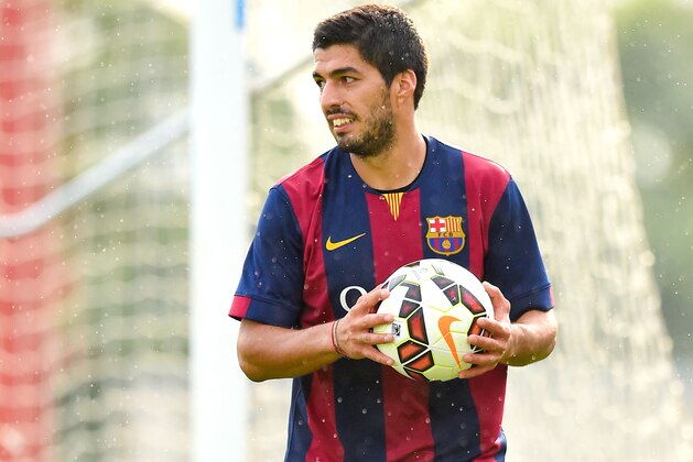 BARCELONA, SPAIN - SEPTEMBER 24:  Luis Suarez of FC Barcelona looks on during a friendly match between FC Barcelona B and Indonesia U19 at Ciutat Esportiva on September 24, 2014 in Barcelona, Spain.  (Photo by David Ramos/Getty Images)