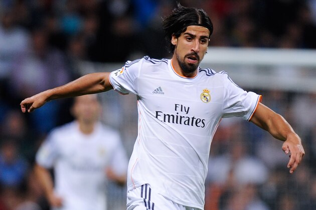 MADRID, SPAIN - SEPTEMBER 28:  Sami Khedira of Real Madrid CF runs with the ball during the La Liga match between Real Madrid CF and Club Atletico de Madrid at Bernabeu on September 28, 2013 in Madrid, Spain.  (Photo by David Ramos/Getty Images)