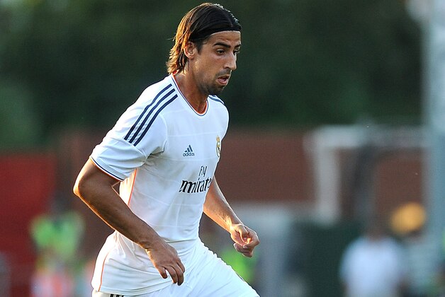 BOURNEMOUTH, ENGLAND - JULY 21: Sami Khedira of Real Madrid attacks during the pre season friendly match between Bournemouth and Real Madrid at Goldsands Stadium on July 21, 2013 in Bournemouth, England, (Photo by Charlie Crowhurst/Getty Images)