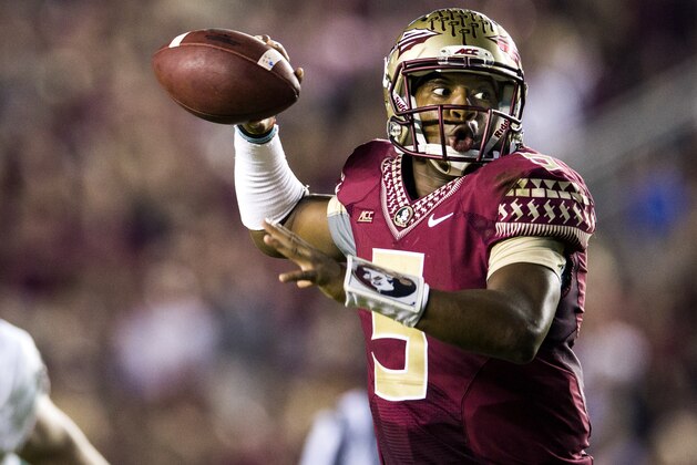 Florida State quarterback Jameis Winston rolls out to pass late in the second half of an NCAA college football game against Notre Dame in Tallahassee, Fla., Saturday, Oct. 18, 2014. Florida State won 31-27. (AP Photo/Mark Wallheiser)