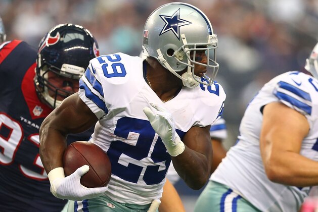 ARLINGTON, TX - OCTOBER 05:  DeMarco Murray #29 of the Dallas Cowboys runs the ball against the Houston Texans in the second half at AT&T Stadium on October 5, 2014 in Arlington, Texas.  (Photo by Ronald Martinez/Getty Images)