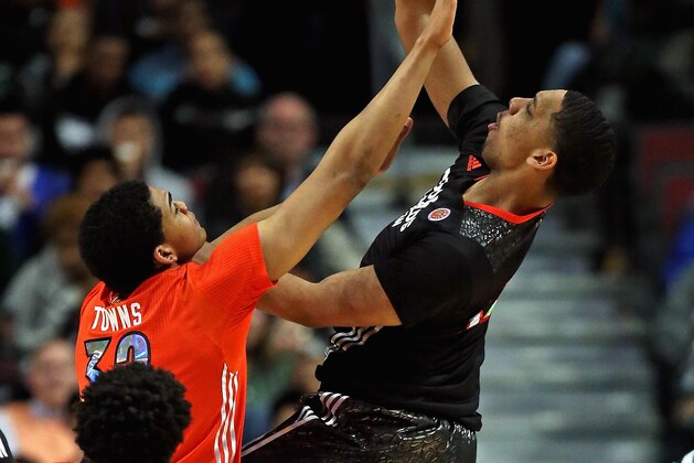 CHICAGO, IL - APRIL 2: Jahlil Okafor #22 of the West team shoots against Karl-Anthony Towns #32 of the East team during the 2014 McDonald's All American Game at United Center on April 2, 2014 in Chicago, Illinois. The West defeated the East 105-102. (Photo by Jonathan Daniel/Getty Images)