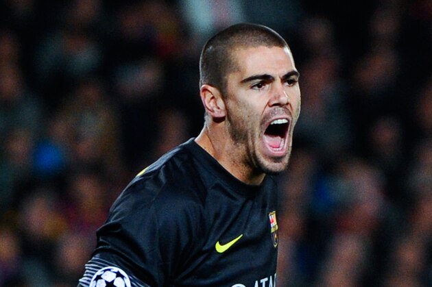 BARCELONA, SPAIN - MARCH 12: Victor Valdes of FC Barcelona reacts during the UEFA Champions League Round of 16 second leg match between FC Barcelona and Manchester City at Camp Nou on March 12, 2014 in Barcelona, Spain.  (Photo by David Ramos/Getty Images)