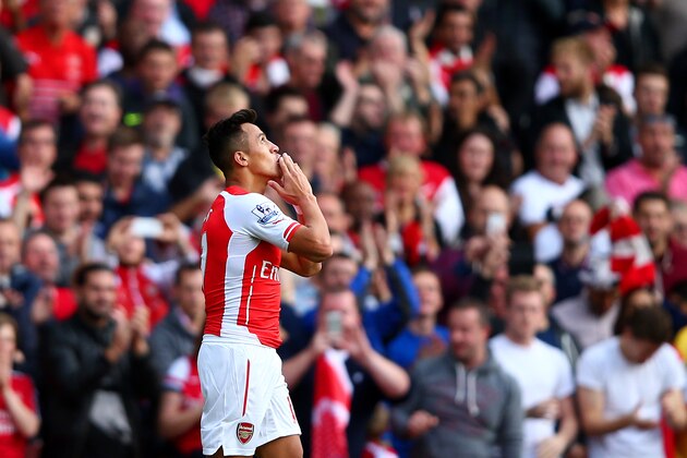LONDON, ENGLAND - OCTOBER 18:  Alexis Sanchez of Arsenal celebrates after scoring the opening goal during the Barclays Premier League match between Arsenal and Hull City at Emirates Stadium on October 18, 2014 in London, England.  (Photo by Clive Rose/Getty Images)