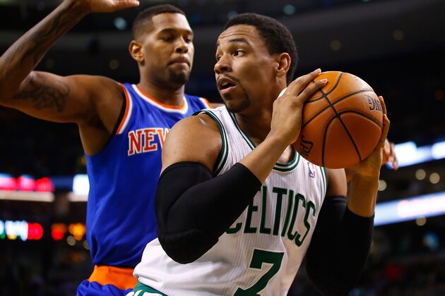 BOSTON, MA - MARCH 12: Jared Sullinger #7 of the Boston Celtics is defended by Jeremy Tyler #4 of the New York Knicks in the second half during the game at TD Garden on March 12, 2014 in Boston, Massachusetts. NOTE TO USER: User expressly acknowledges and agrees that, by downloading and or using this photograph, User is consenting to the terms and conditions of the Getty Images License Agreement.  (Photo by Jared Wickerham/Getty Images)