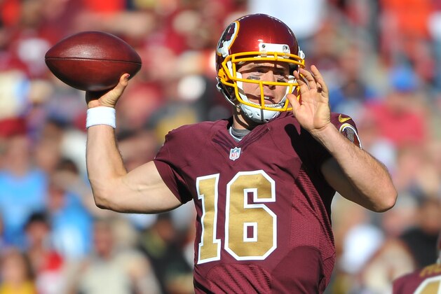 LANDOVER, MD - OCTOBER 19:  Colt McCoy #16 of the Washington Redskins looks to pass against the Tennessee Titans during third quarter at FedEx Field on October 19, 2014 in Landover, Maryland.  (Photo by Larry French/Getty Images)