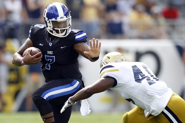 Oct 11, 2014; Atlanta, GA, USA; Duke Blue Devils quarterback Anthony Boone (7) runs the ball against the Georgia Tech Yellow Jackets in the second quarter at Bobby Dodd Stadium. Mandatory Credit: Brett Davis-USA TODAY Sports