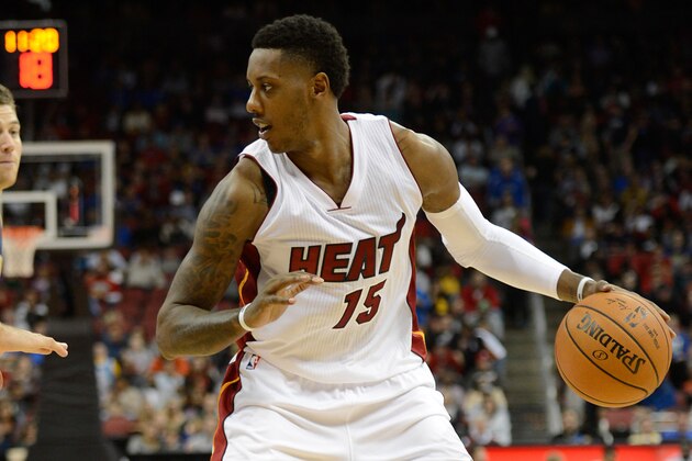 Oct 4, 2014; Louisville, KY, USA; Miami Heat guard Mario Chalmers (15) dribbles against the New Orleans Pelicans during the second half of play at KFC Yum! Center. New Orleans defeated Miami 98-86.  Mandatory Credit: Jamie Rhodes-USA TODAY Sports