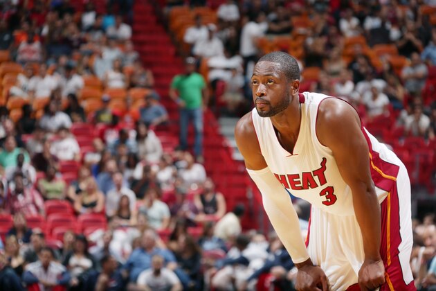 MIAMI, FL - OCTOBER 14: Dwyane Wade #3 of the Miami Heat prepares for the play against the Atlanta Hawks during the game on October 14, 2014 at AmericaAirlines Arena in Miami, Florida. NOTE TO USER: User expressly acknowledges and agrees that, by downloading and or using this Photograph, user is consenting to the terms and conditions of the Getty Images License Agreement. Mandatory Copyright Notice: Copyright 2014 NBAE (Photo by Issac Baldizon/NBAE via Getty Images)