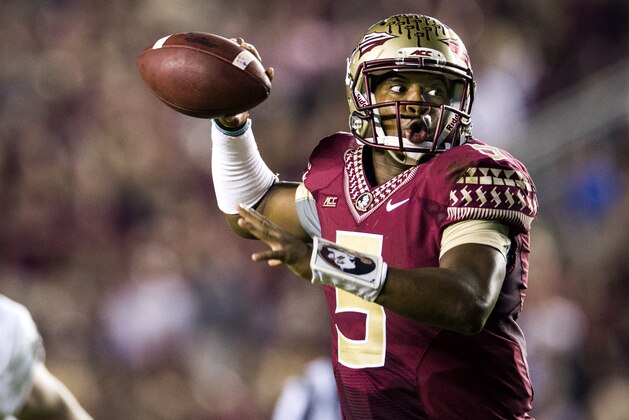 Florida State quarterback Jameis Winston rolls out to pass late in the second half of an NCAA college football game against Notre Dame in Tallahassee, Fla., Saturday, Oct. 18, 2014. Florida State won 31-27. (AP Photo/Mark Wallheiser)