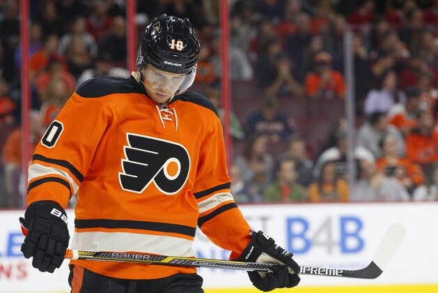 Philadelphia Flyers' Brayden Schenn looks down during the first period of an NHL hockey game against the Montreal Canadiens, Saturday, Oct. 11, 2014, in Philadelphia. The Canadians won 4-3 in the shootout. (AP Photo/Chris Szagola)