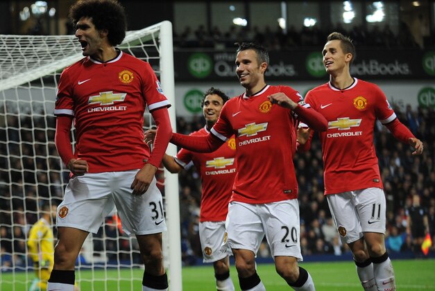 Manchester United's Marouane Fellaini, left, celebrates after scoring against West Brom during the English Premier League soccer match between West Bromwich Albion and Manchester United at the Hawthorns, Birmingham, England, Monday, Oct. 20, 2014. (AP Photo/Rui Vieira)