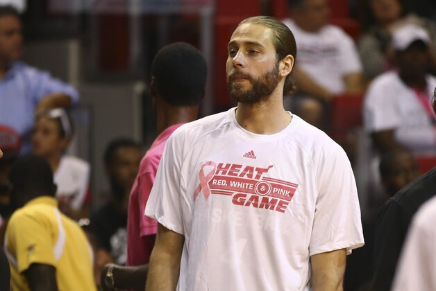 Miami Heat's Josh McRoberts during the Miami Heat Red, White, and Pink breast cancer awareness  scrimmage Wednesday, Oct. 1, 2014 in Miami.  (AP Photo/J Pat Carter)