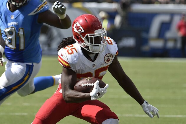 Kansas City Chiefs running back Jamaal Charles runs upfield on his way to a touchdown against the San Diego Chargers during the first half of an NFL football game Sunday, Oct. 19, 2014, in San Diego. (AP Photo/Denis Poroy)