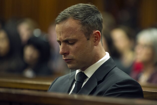 Oscar Pistorius cries in court in Pretoria, South Africa, Friday, Oct. 17, 2014 during the last day of sentencing procedures where the defense and prosecution will put their case for and against sentencing. Pistorius was found guilty last month of culpable homicide in the shooting death of his girlfriend Reeva Steenkamp  on Valentine's Day in 2013. (AP Photo/Mujahid Safodien, Pool)