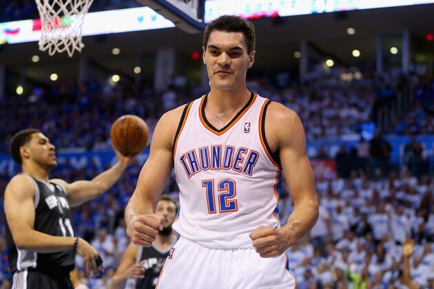 OKLAHOMA CITY, OK - MAY 27: Steven Adams #12 of the Oklahoma City Thunder reacts after a play in the second half against the San Antonio Spurs during Game Four of the Western Conference Finals of the 2014 NBA Playoffs at Chesapeake Energy Arena on May 27, 2014 in Oklahoma City, Oklahoma. NOTE TO USER: User expressly acknowledges and agrees that, by downloading and or using this photograph, User is consenting to the terms and conditions of the Getty Images License Agreement.  (Photo by Ronald Martinez/Getty Images)
