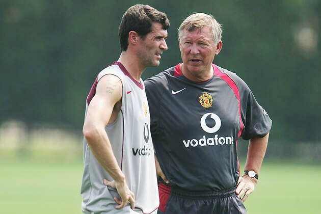 PHILADELPHIA - JULY 22:  Footballer Roy Keane and Manager Sir Alex Ferguson stand together during a training session with Manchester United at the NovaCare Complex on  July 22, 2004 in Philadelphia, United States. The USA tour will take in pre-season friendly matches in Philadelphia, Chicago and New York. (Photo by Phil Cole/Getty Images)