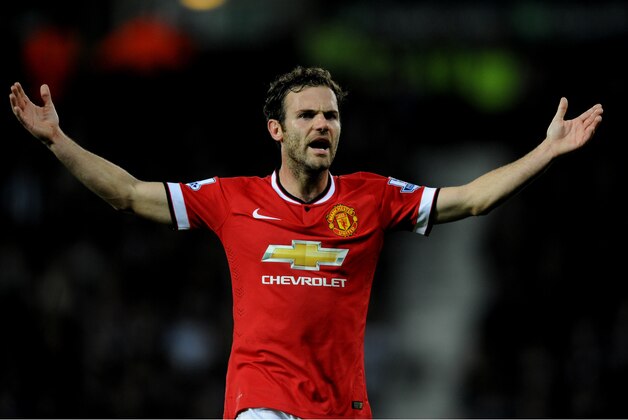 Manchester United's Juan Mata gestures during the English Premier League soccer match between West Bromwich Albion and Manchester United at the Hawthorns, Birmingham, England, Monday, Oct. 20, 2014. (AP Photo/Rui Vieira)