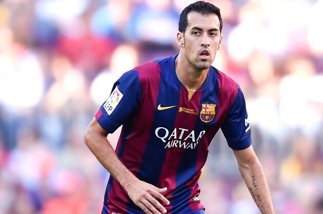 BARCELONA, SPAIN - SEPTEMBER 27:  Sergio Busquets of FC Barcelona runs with the ball during the La Liga match between FC Barcelona and Granada CF at Camp Nou on September 27, 2014 in Barcelona, Spain.  (Photo by David Ramos/Getty Images)