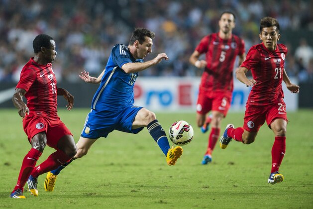 HONG KONG - OCTOBER 14:  Lionel Messi of Argentina in action during the International Friendly Match between Hong Kong and Argentina at the Hong Kong Stadium on October 14, 2014 in Hong Kong, Hong Kong.  (Photo by Victor Fraile/Getty Images)