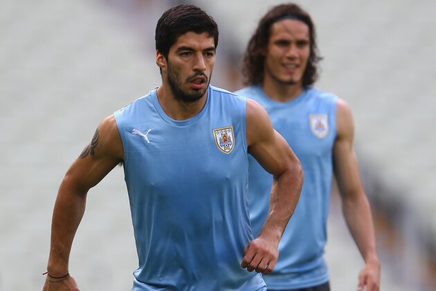 FORTALEZA, BRAZIL - JUNE 13:  Luis Suarez (L) alongside  Edinson Cavani during the Uruguay Training session at Castelao on June 13, 2014 in Fortaleza, Brazil.  (Photo by Michael Steele/Getty Images)