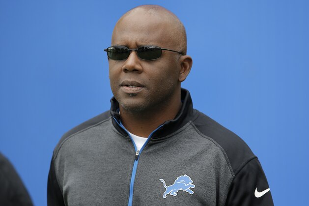 Detroit Lions general manager Martin Mayhew watches during NFL football training camp in Allen Park, Mich., Monday, July 28, 2014. (AP Photo/Paul Sancya)