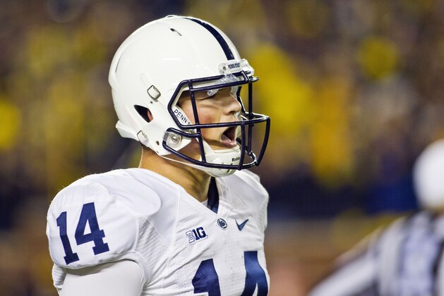 Penn State quarterback Christian Hackenberg (14) reacts between downs in the fourth quarter of  an NCAA college football game against Michigan in Ann Arbor, Mich., Saturday, Oct. 11, 2014. Michigan won 18-13. (AP Photo/Tony Ding)
