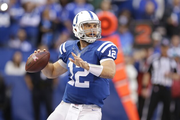 Indianapolis Colts quarterback Andrew Luck (12) throws during the second half of an NFL football game against the Cincinnati Bengals Sunday, Oct. 19, 2014, in Indianapolis. (AP Photo/Michael Conroy)