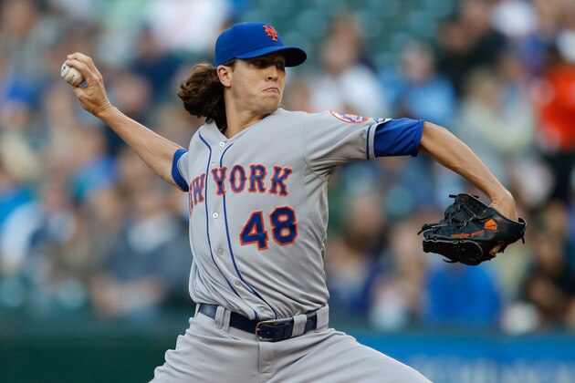 SEATTLE, WA - JULY 22:  Starting pitcher Jacob deGrom #48 of the New York Mets pitches in the first inning against the Seattle Mariners at Safeco Field on July 22, 2014 in Seattle, Washington.  (Photo by Otto Greule Jr/Getty Images)