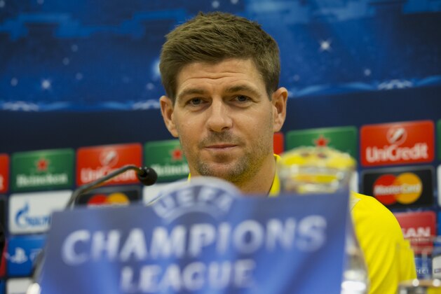Liverpool's Steven Gerrard speaks during a press conference at Anfield Stadium in Liverpool, Tuesday, Oct. 21, 2014. Liverpool will play Real Madrid in a Champion's League Group B soccer match on Wednesday. (AP Photo/Jon Super)