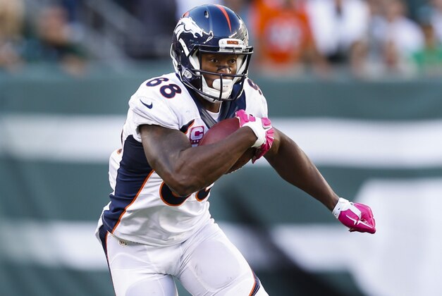 Denver Broncos wide receiver Demaryius Thomas (88) takes the ball up field against the New York Jets during the fourth quarter of an NFL football game, Sunday, Oct. 12, 2014, in East Rutherford, N.J. (AP Photo/Kathy Willens)