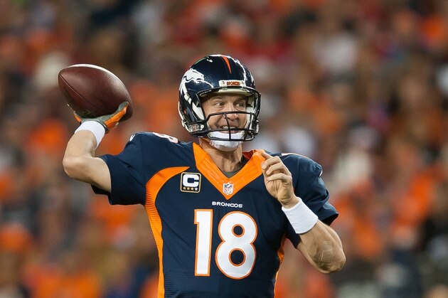 DENVER, CO - OCTOBER 19:  Quarterback Peyton Manning #18 of the Denver Broncos passes against the San Francisco 49ers during a game at Sports Authority Field at Mile High on October 19, 2014 in Denver, Colorado.  (Photo by Dustin Bradford/Getty Images)