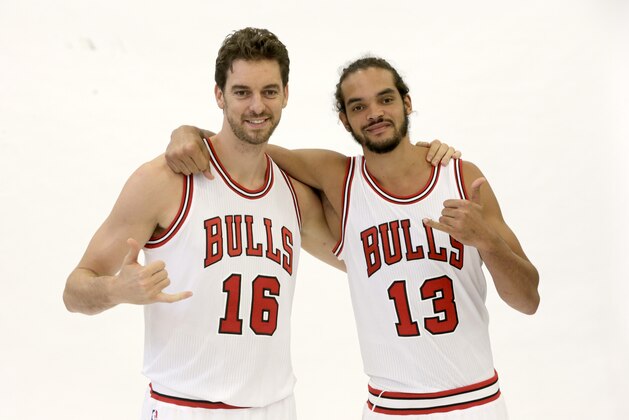 Chicago Bulls forward Pau Gasol (16) and center Joakim Noah pose for a photograph during the Bulls' NBA basketball media day, Monday, Sept. 29, 2014, in Chicago. (AP Photo/Charles Rex Arbogast)