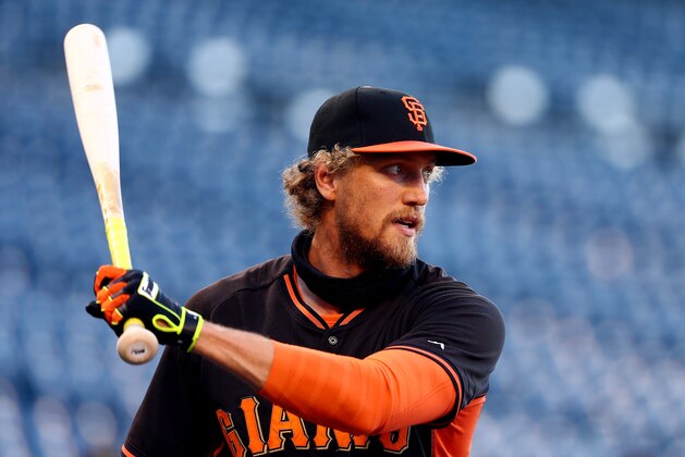 KANSAS CITY, MO - OCTOBER 20: Hunter Pence #8 of the San Francisco Giants warms up during the 2014 World Series Media Day at Kauffman Stadium on October 20, 2014 in Kansas City, Missouri.  (Photo by Elsa/Getty Images)