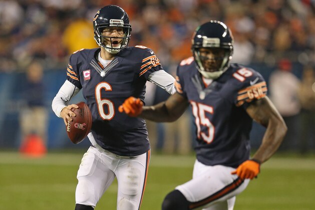 CHICAGO, IL - OCTOBER 22:  Jay Cutler #6 of the Chicago Bears rolls out as Brandon Marshall #15 runs his route against the Detroit Lions at Soldier Field on October 22, 2012 in Chicago, Illinois. The Bears defeated the Lions 13-7.  (Photo by Jonathan Daniel/Getty Images)