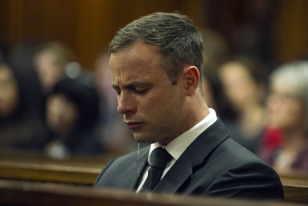 Oscar Pistorius cries in court in Pretoria, South Africa, Friday, Oct. 17, 2014 during the last day of sentencing procedures where the defense and prosecution will put their case for and against sentencing. Pistorius was found guilty last month of culpable homicide in the shooting death of his girlfriend Reeva Steenkamp  on Valentine's Day in 2013. (AP Photo/Mujahid Safodien, Pool)