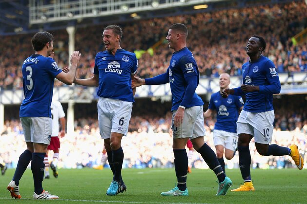 LIVERPOOL, ENGLAND - OCTOBER 18:  Phil Jagielka of Everton celebrates with team mates after scoring the opening goal during the Barclays Premier League match between Everton and Aston Villa at Goodison Park on October 18, 2014 in Liverpool, England.  (Photo by Chris Brunskill/Getty Images)